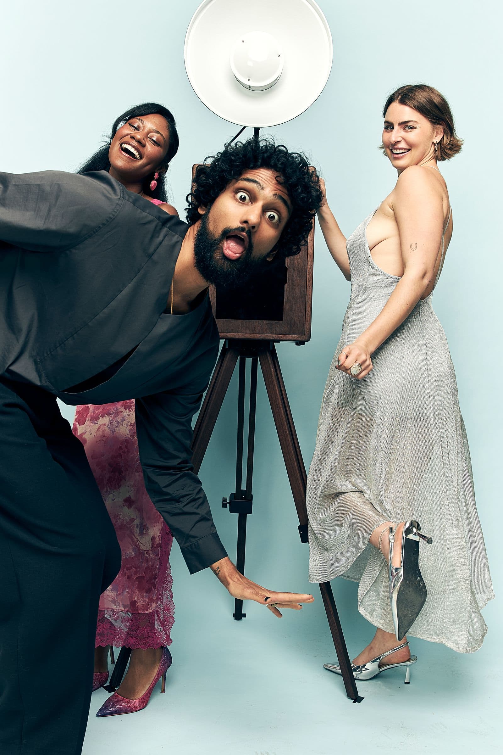 Couple sharing a joyful moment at their wedding photo booth